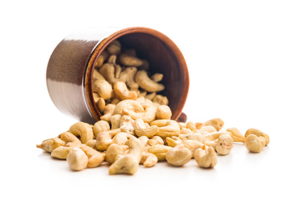 istock Roasted cashew nuts isolated on white background. 2185804415