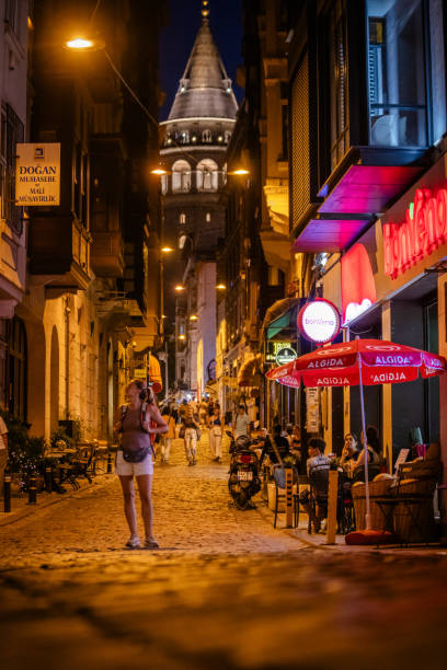 istock Night scene: lively street leading to Galata Tower. 2185809513