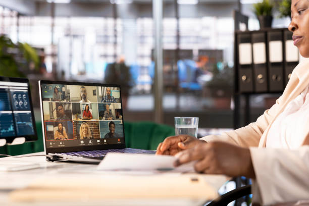 istock CEO talking with team in videocall, setting goals for company performance 2185809801