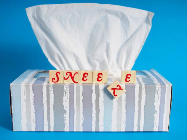 To sneeze all shaken up. Concept of flu or allergy season with a shifting box of tissue with \
