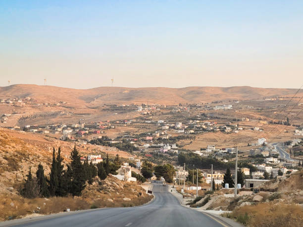 istock A road leading to a distant desert village 2185816587