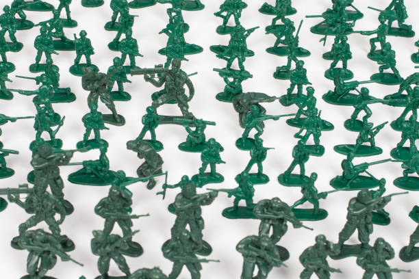 Toy soldiers isolated on black
