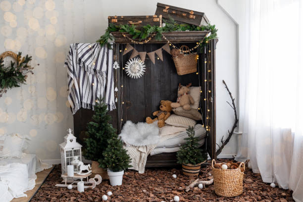 istock Cozy holiday decor setup with stuffed animals and greenery in a charming room 2185826145