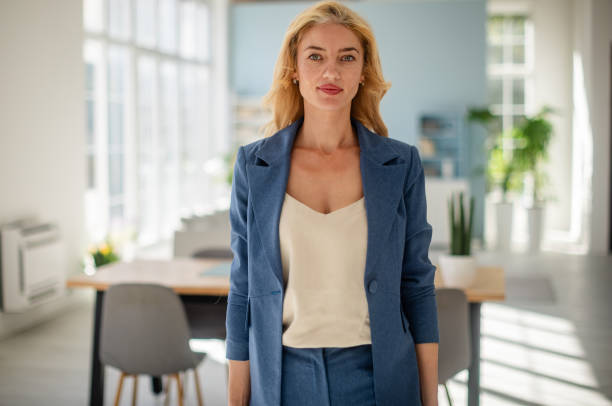 istock Elegant female professional in crisp office setting 2185827158