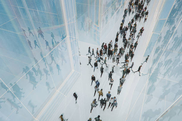 istock Crowds of people walking in VR streets 2185829153