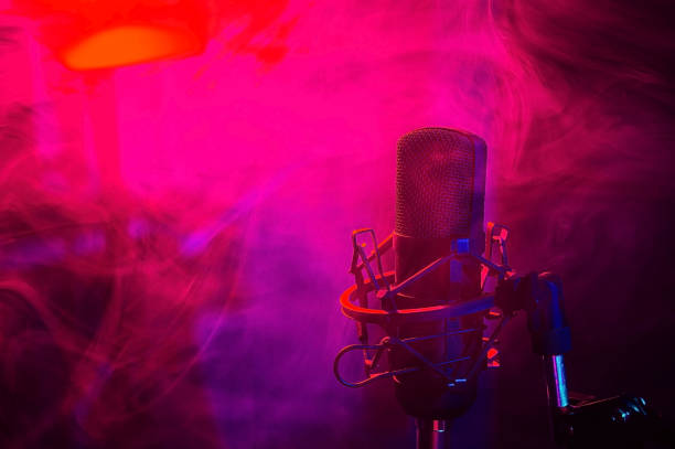 istock Professional microphone in red blue smoke on a black background. 2185830704