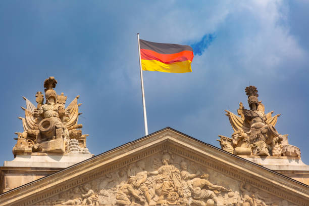 istock German Flag on Historic Building Facade, Berlin, Germany 2185839691