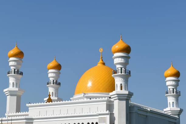 istock A beautiful white mosque with yellow tops 2185841152