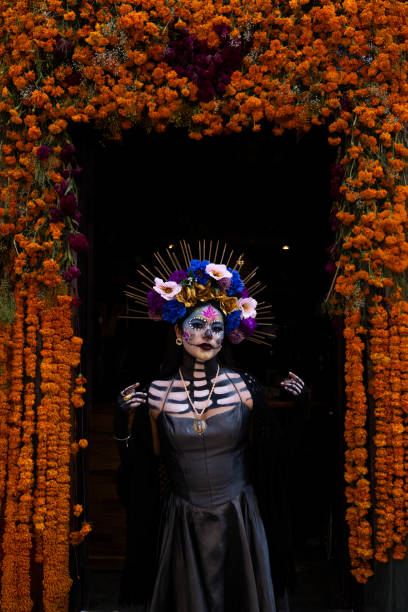 istock Catrina with sempasuchil flowers 2185841395