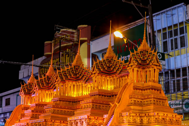 Sakon Nakhon, Thailand - October 16, 2024: End of Buddhist Lent, a parade to showcase Thai identity through carving wax castles, candles, and various performances reflecting the way of life.