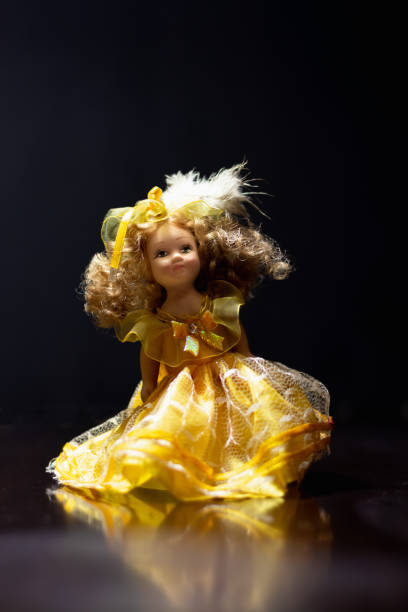 doll near window