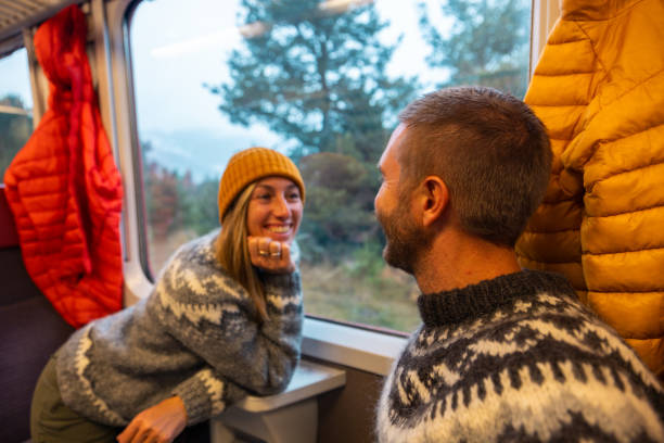 istock Couple Enjoying Scenic Train Ride 2185849034