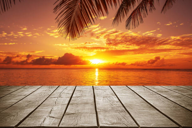 istock Empty wooden table top with tropical ocean sunset background 2185854877