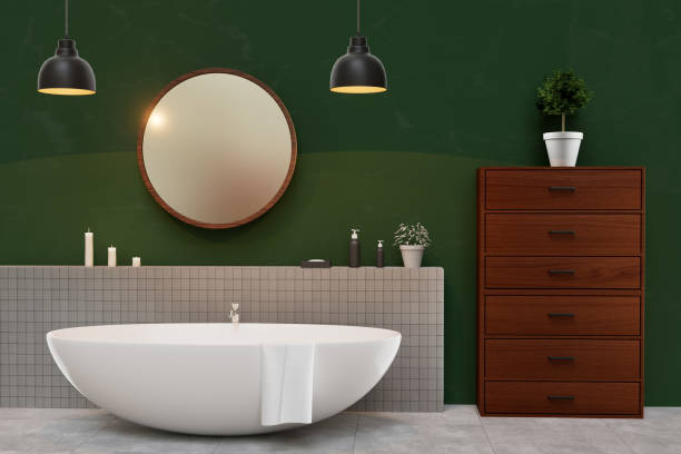 istock A bathroom with a large white bathtub and a mirror above it 2185861051
