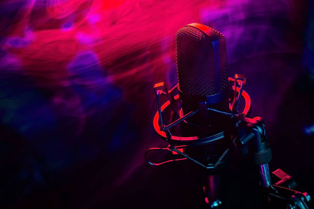 istock Professional microphone in red blue smoke on a black background. 2185862733