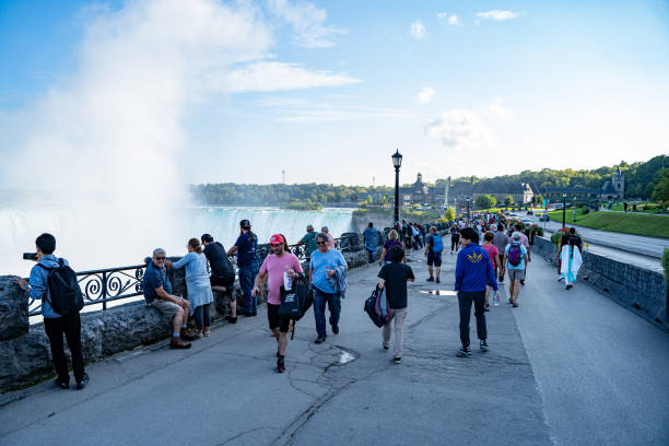 Tourists on the road in Niagara Falls. Niagara Falls, Canada - September 20, 2024.