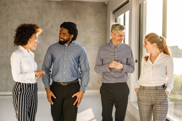 istock Happy business team having a conversation in the office. 2185863357