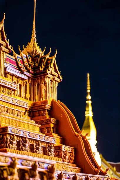 The traditional Prasat Phueng The Bee Castle Procession is an annual event held at the end of the Buddhist Lent season in Sakon Nakhon. It is made from beeswax and candles as construction materials.