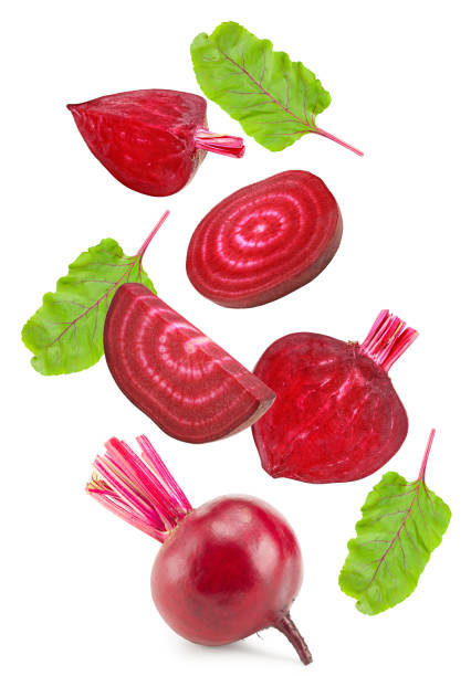 istock flying beetroot with pieces of beetroot and green leaf isolated on white background. clipping path 2185865836