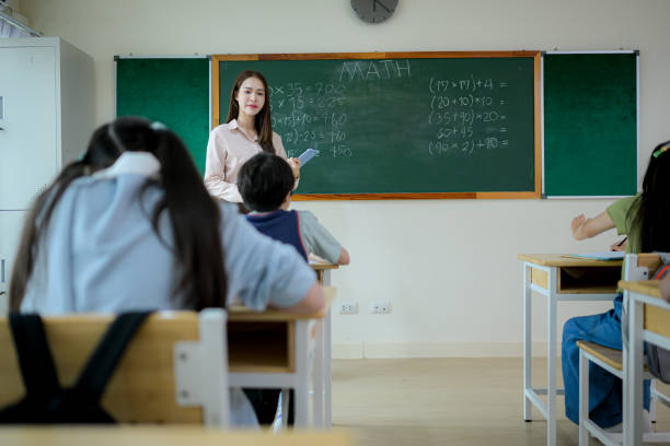 istock STEM lesson, Teacher and students in mathematics classroom 2185867979