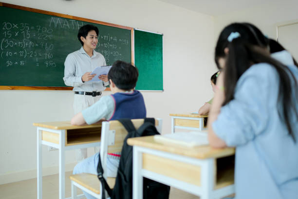 istock STEM lesson, Teacher and students in mathematics classroom 2185868001