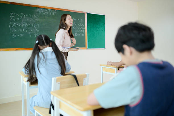 istock STEM lesson, Teacher and students in mathematics classroom 2185868084