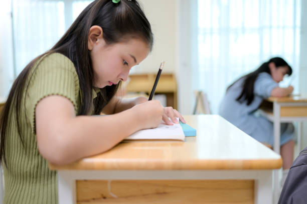 istock STEM lesson, Teacher and students in mathematics classroom 2185868125