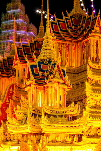 The traditional Prasat Phueng The Bee Castle Procession is an annual event held at the end of the Buddhist Lent season in Sakon Nakhon. It is made from beeswax and candles as construction materials.
