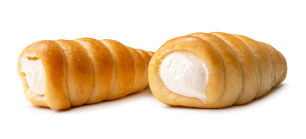 istock Front view of two puff pastry cream horns isolated on white background with clipping path 2185871535