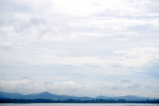 Nature landscape background, Lake and forest with mountain and clouds sky background