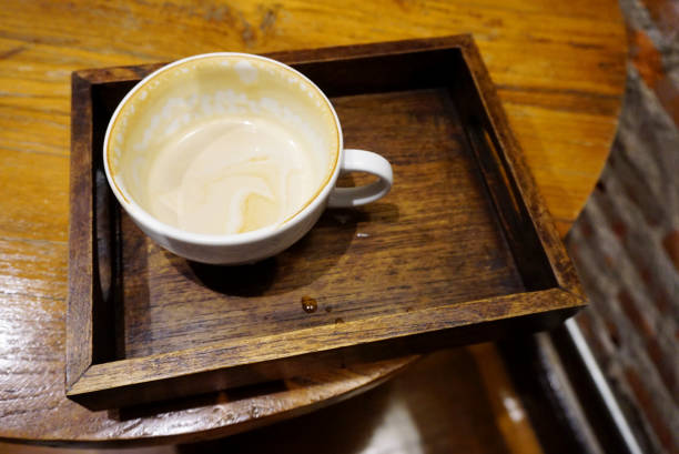 Empty cup in wooden tray, Coffee cup