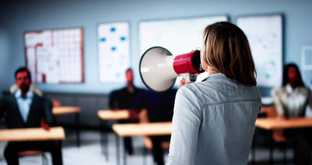 istock Angry Strict Teacher Yelling In School 2185873105