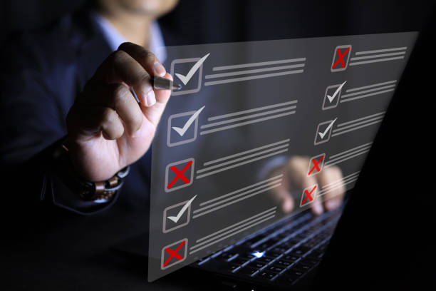 istock Businessman man using pen to mark right and wrong 2185875342