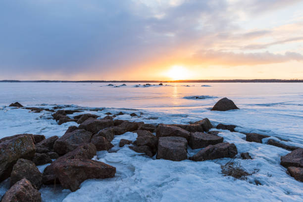 istock Granite rocks are covered with snow. Winter landscape 2185877119