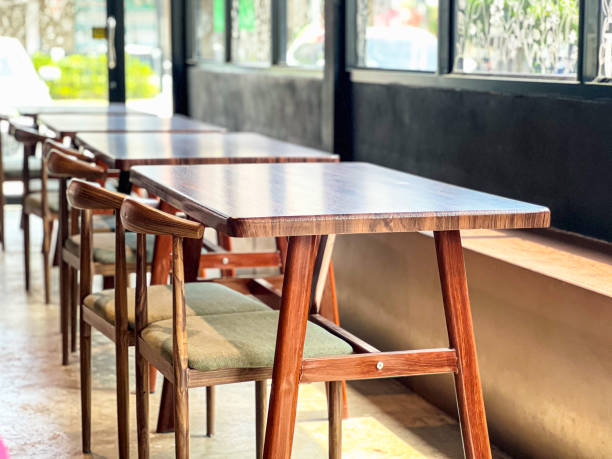 istock Wooden Tables and Chairs in Modern Coffee Shop, Cozy Interior Design, Sunlight Reflection, Contemporary Style 2185877606