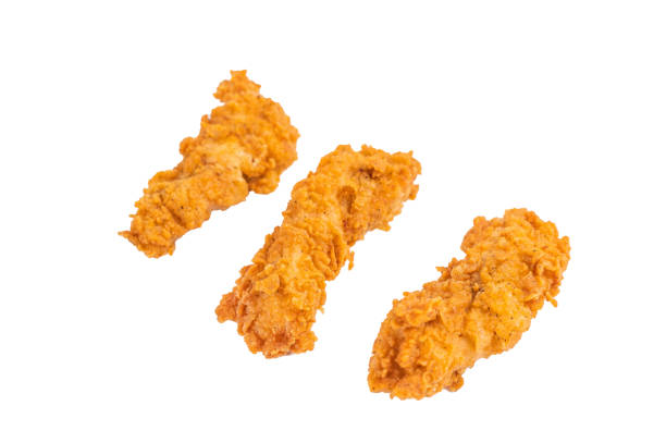 istock Crispy fried chicken strips from breast fillet isolated on white background 2185878393
