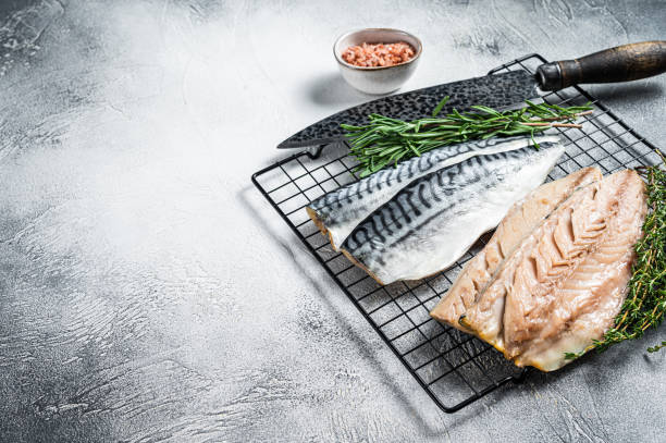 istock Fresh sliced mackerel fillet fish. White background. Top view. Copy space 2185880896