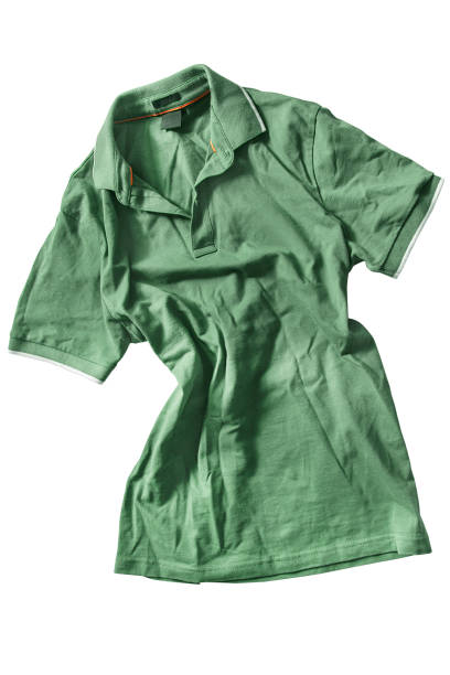 istock Green shirt isolated 2185881494