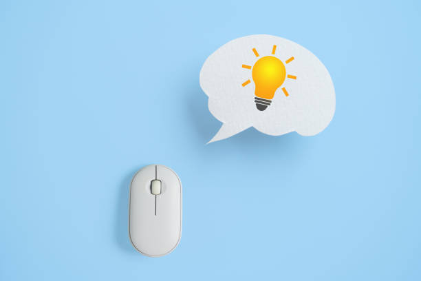 istock brighten lightbulb sign on real white speech bubble paper cut with wireless mouse on blue background 2185883278