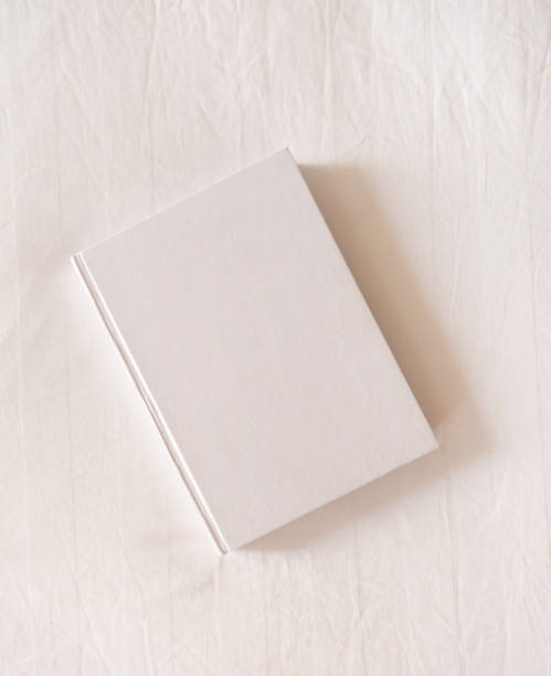 istock White magazine mockup on white hotel bed 2185885344