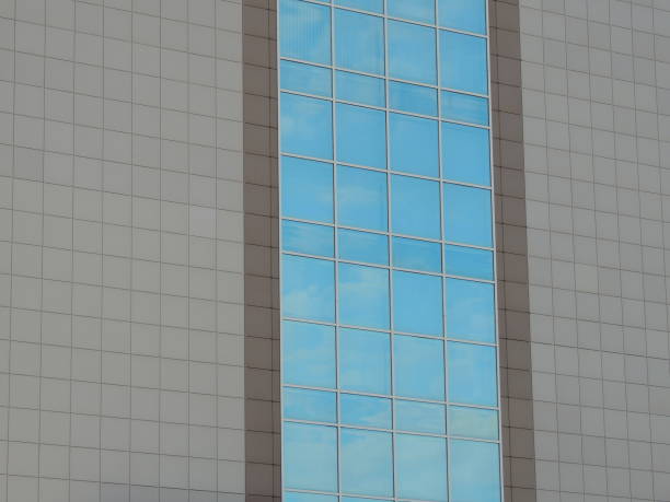 istock wall of a modern building with mirrored windows 2185886723