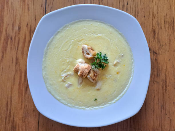 Delicious Corn Soup With Crouton And Parsley. Food Menu. Top View.