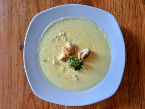 Corn Soup With Crouton And Parsley. Food Menu. Top View.