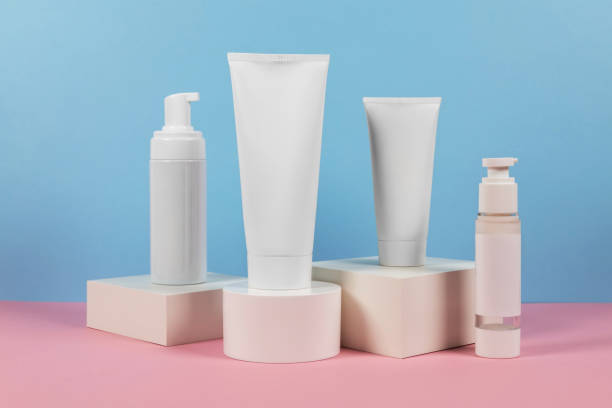 istock White plastic tubes without label displayed on podium. Scene for advertising cosmetics base 2185891101