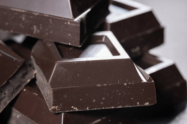istock broken chocolate bar chips, parts or pieces pile 2185892885