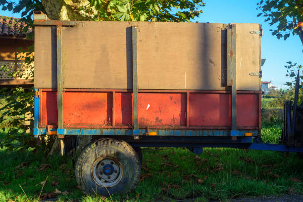 istock Red rustic cart in a farm 2185893490