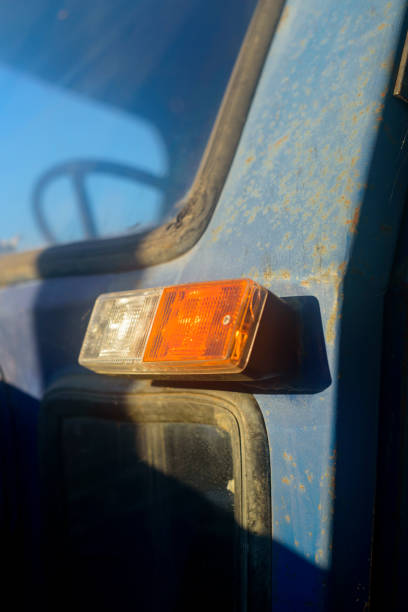 istock White and orange light in old tractor 2185893504
