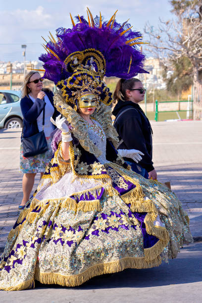 People in makeup and carnival costumes during Fat Tuesday at Mardi Gras carnival in Valletta, Malta People in makeup and carnival costumes during Fat Tuesday at Mardi Gras carnival in city: Valletta, Malta - February 23, 2020 mardi gras body painting stock pictures, royalty-free photos & images