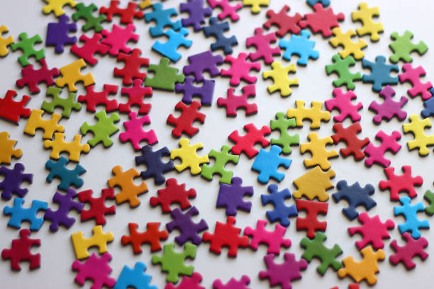 istock Colorful Jigsaw Puzzle Pieces 2185893628