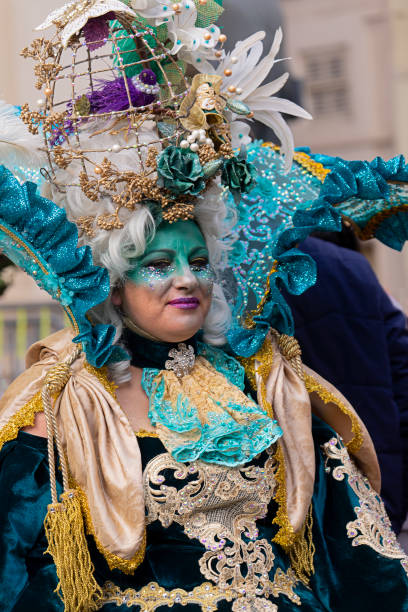 People in makeup and carnival costumes during Fat Tuesday at Mardi Gras carnival in Valletta, Malta People in makeup and carnival costumes during Fat Tuesday at Mardi Gras carnival in city: Valletta, Malta - February 23, 2020 mardi gras body painting stock pictures, royalty-free photos & images